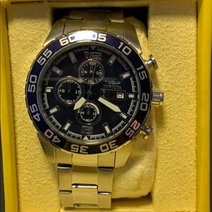 Invicta wrist watch blue face silver link band